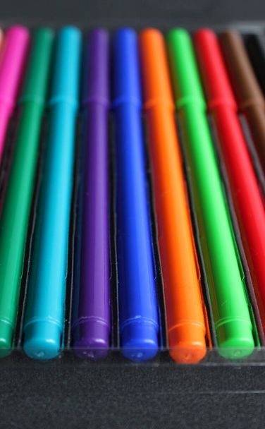 Bottom Part Of Multi Colored Felt Pens Stacked In Tray Vertical Stock Photo - Photo, Image