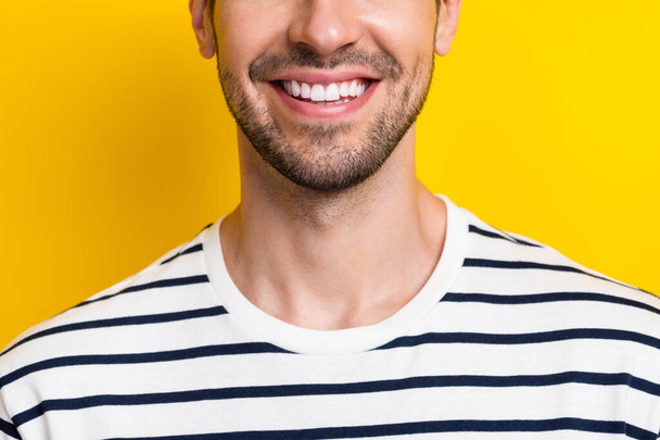 Close up cropped portrait of satisfied glad person face toothy beaming smile isolated on yellow color background. - Foto, afbeelding