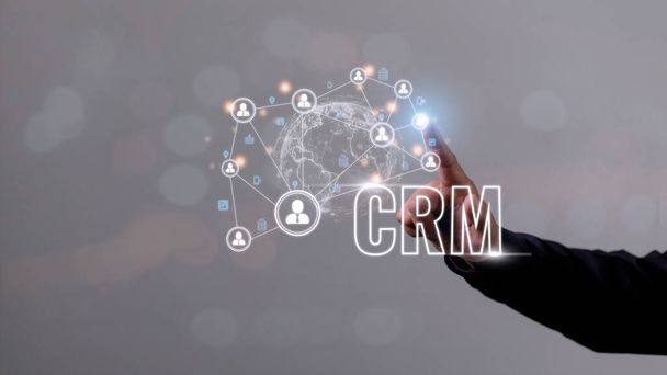 CRM Customer Relationship Management für Business Sales Marketing Systemkonzept präsentiert in futuristischer grafischer Oberfläche der Service-Anwendung zur Unterstützung der CRM-Datenbankanalyse. - Foto, Bild