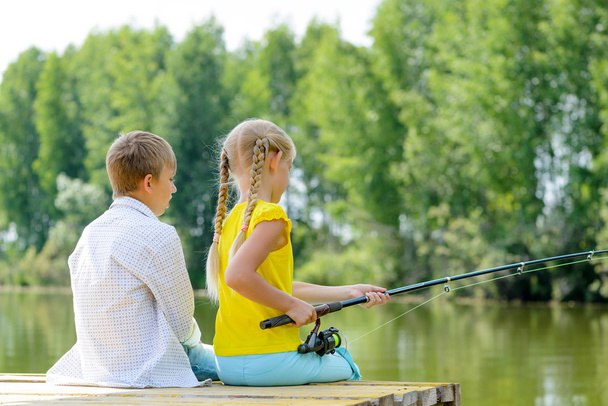 boy and girl fishing - Photo, Image