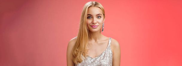 Lifestyle. Waist-up friendly charming elegant blond girl long hairstyle in silver stylish dress smiling amused listening story chatting boyfriend eating-out romantic date have interesting conversation - Photo, Image