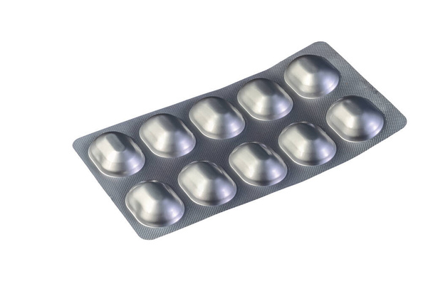 Closeup of an isolated blister pack with pills - Photo, Image