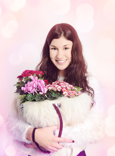 Beautiful girl with flowers - Fotoğraf, Görsel