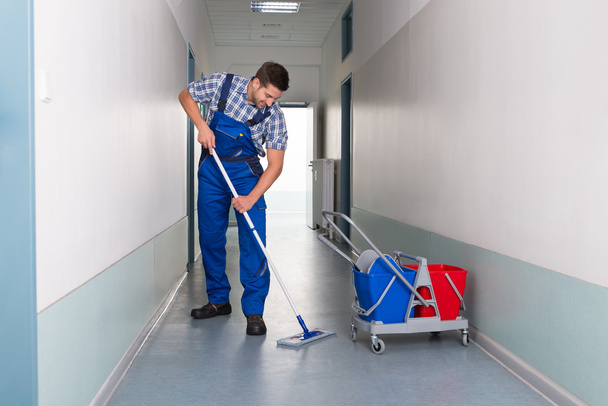 Male Worker Cleaning Office Corridor - Fotoğraf, Görsel