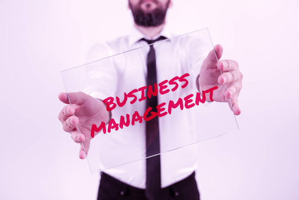 Writing displaying text Business Management, Business idea Overseeing Supervising Coordinating Business Operations - Photo, Image