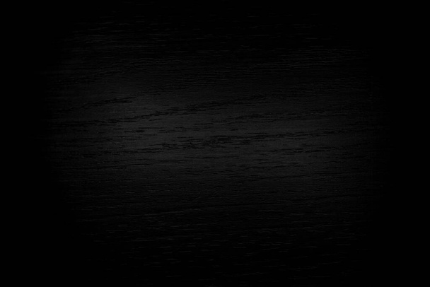Black abstract background with wood texture pattern. Black wood wallpaper. - Photo, Image