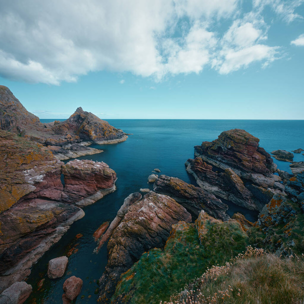Scottish seashore with cliffs. St Abbs Head National Nature Reserve on the Berwickshire coastline, Scotland, UK - Photo, Image