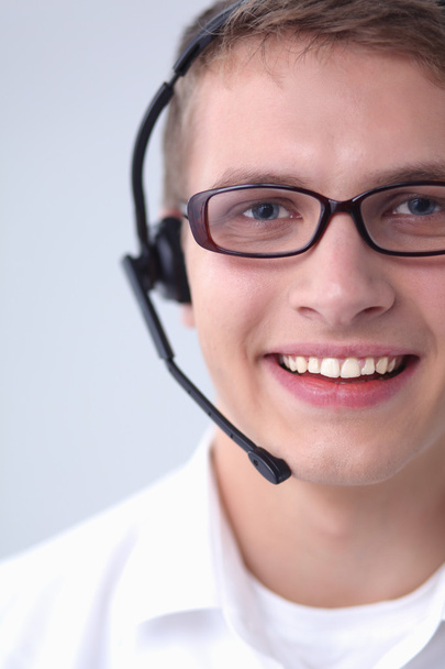 Customer support operator with a headset on white background - Photo, image
