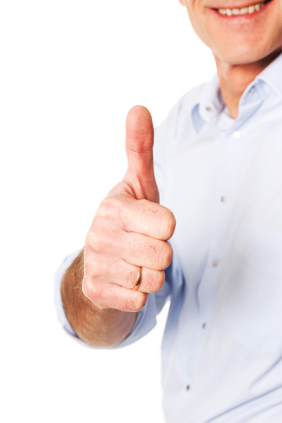 Mature man gesturing  thumb up sign - Φωτογραφία, εικόνα