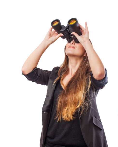 mladá žena dívá dalekohledem - Fotografie, Obrázek