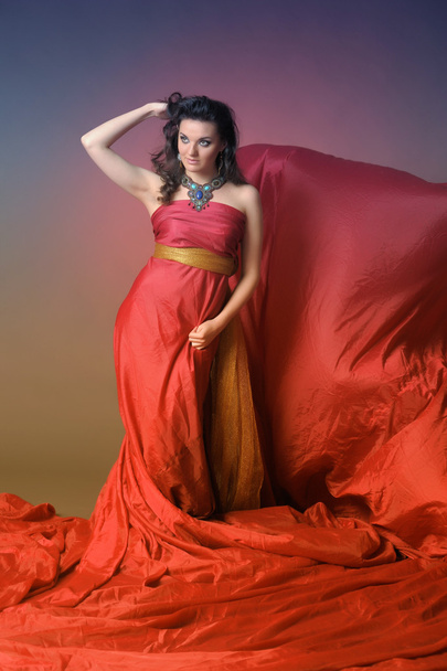 Woman in red flying dress - Photo, Image