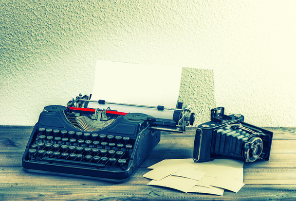 Typewriter and vintage camera. - Фото, зображення