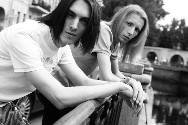young mens posing in the city - 写真・画像