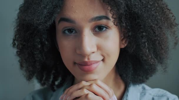 Cute ethnic african american woman curly girl 20s student freelancer dreaming about future think positive female portrait single smiling lady businesswoman feeling comfort relax natural beauty concept - Footage, Video