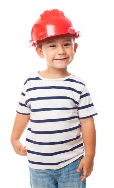 Niño pequeño con casco de albañil
 - Foto, imagen