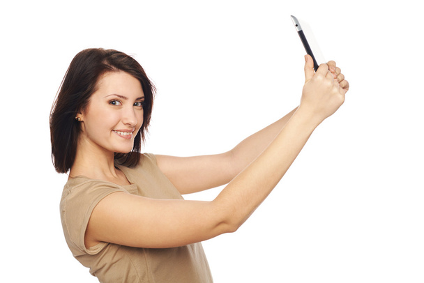 Female taking selfie with digital tablet - 写真・画像