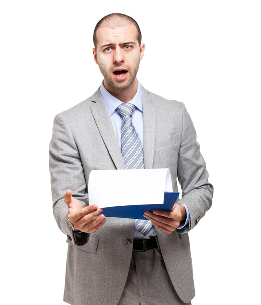Shocked businessman reading document - Foto, Imagem
