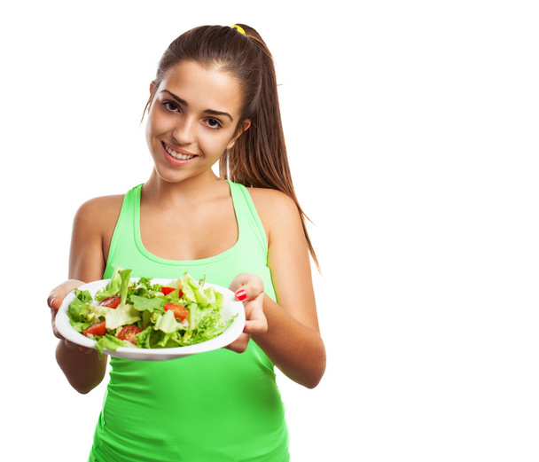 Jolie jeune femme tenant une salade
 - Photo, image