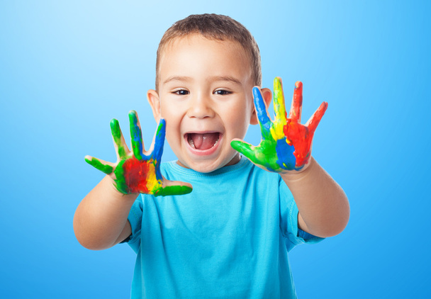 Aranyos gyerek játszik festékkel - Fotó, kép