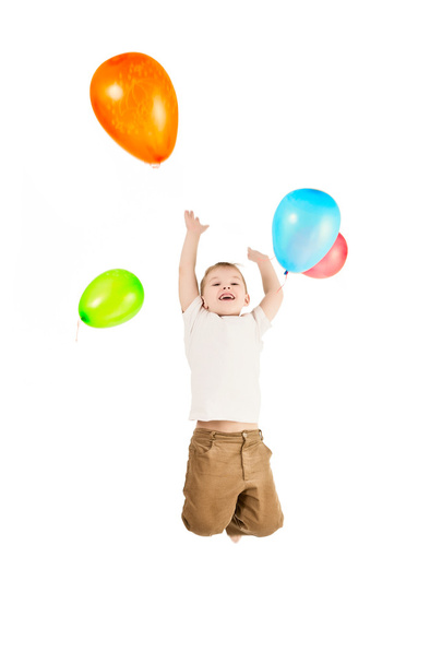 A boy and the balloons - 写真・画像