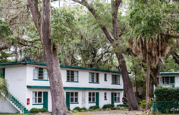 Old White and Green Hotel Behind Oaks - Photo, Image
