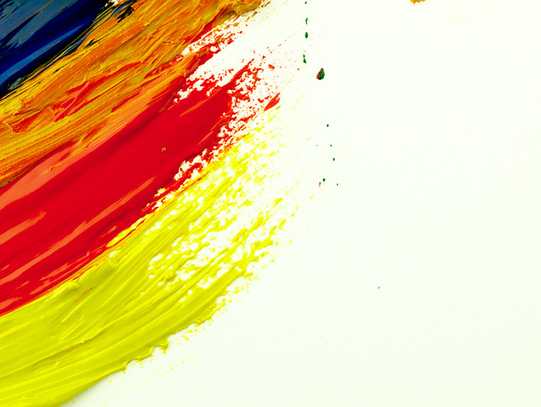 Traces colorful brush on a white sheet of paper. - Photo, Image