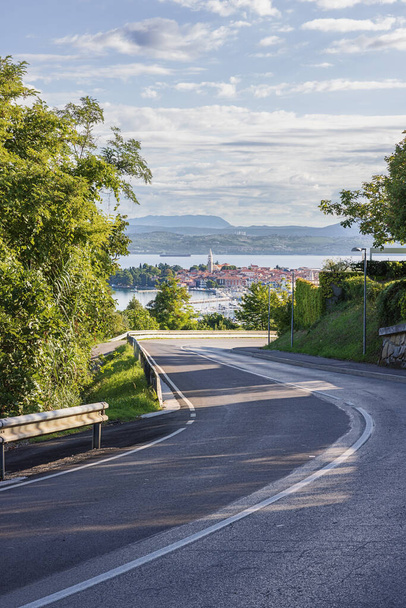 A winding road to Izola with the Adriatic Sea in the background - Photo, Image