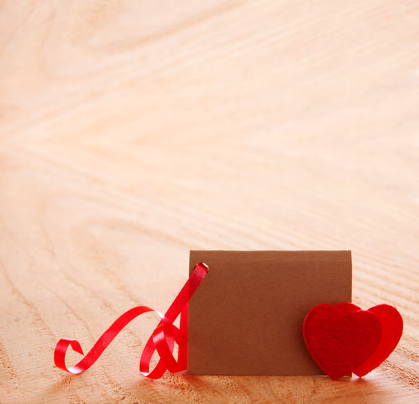 Valentine's Day card and two hearts. - Zdjęcie, obraz