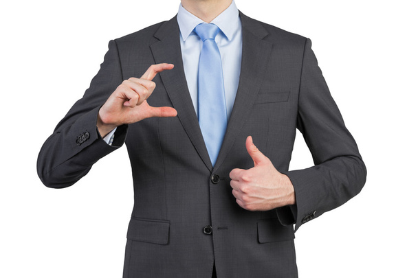 businessman showing thumb up - Фото, изображение