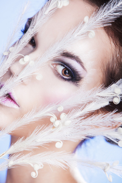 close up portrait of young woman with silver artistic make-up. - 写真・画像