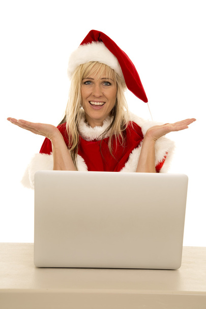 Woman in Santa hat with laptop - Fotoğraf, Görsel