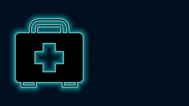 Glowing neon line First aid kit icon isolated on black background. Medical box with cross. Medical equipment for emergency. Healthcare concept. 4K Video motion graphic animation. - Footage, Video