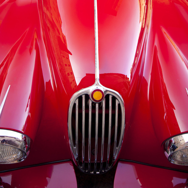 rode luxe retro sportwagen - Foto, afbeelding