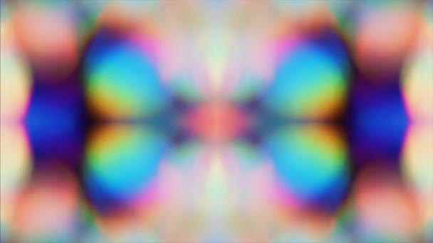 催眠幾何学的なノスタルジックな虹色の対称的なボケの背景。光漏れはゆっくりと動きます。ループアニメーション。シームレスな映像. - 映像、動画
