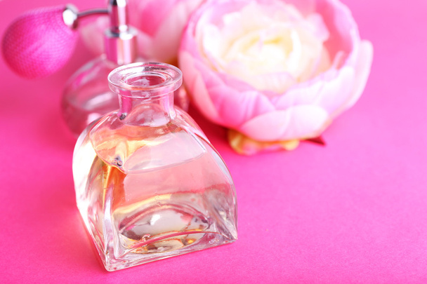 Bottle of perfume with peony - Foto, imagen