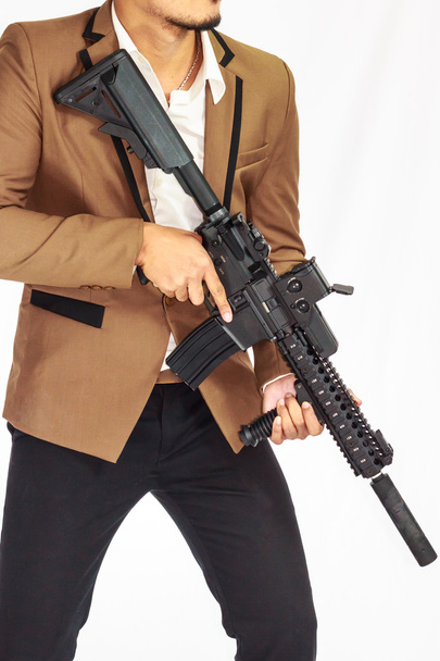 Mature Business Man Holding Gun - Foto, Imagen