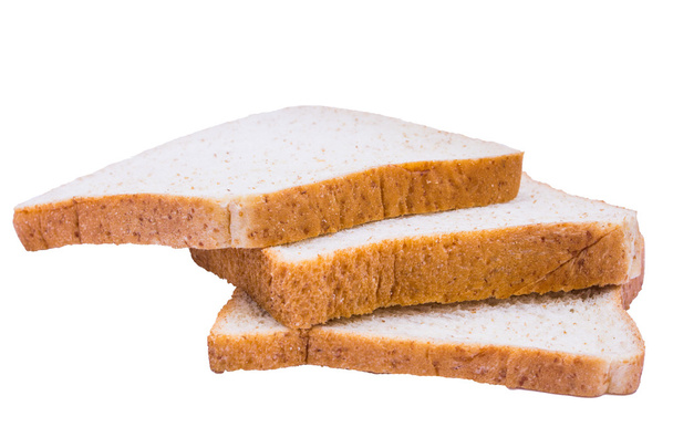Pão de trigo integral fatiado sobre fundo branco - Foto, Imagem