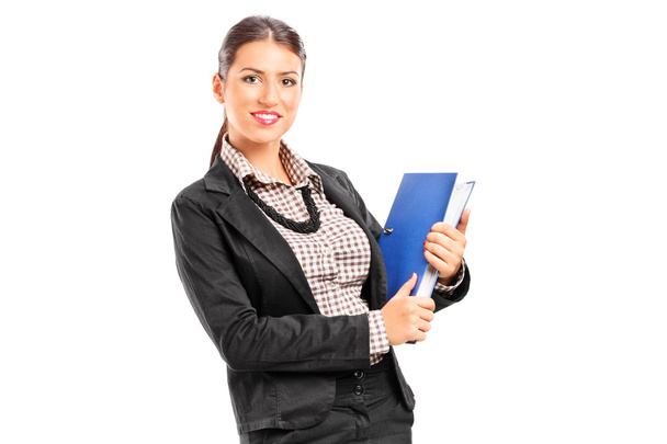 Businesswoman holding a folder - Foto, imagen