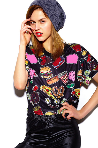 High fashion look.glamor stylish beautiful  young woman model with red lips  in hipster cloth in  beanie - Fotó, kép