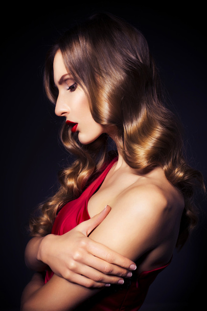 Brunette beautiful luxury woman in red dress with clear skin and - Fotoğraf, Görsel