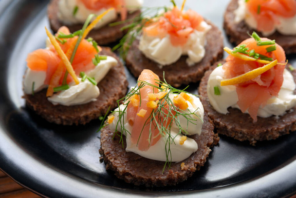delicious appetizers with feta cheese and salmon fillet - Photo, Image