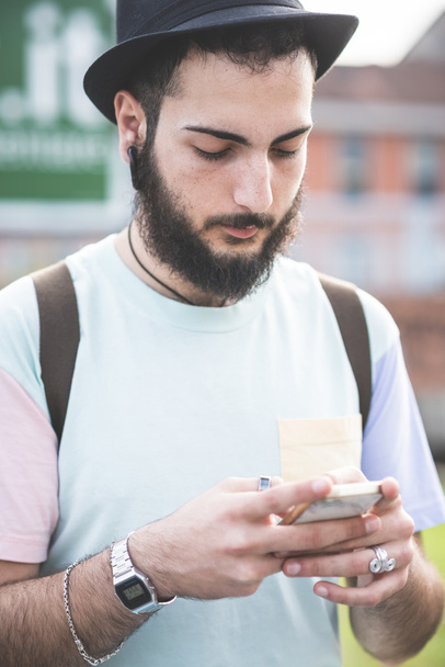 Hipster man using smartphone - Photo, Image