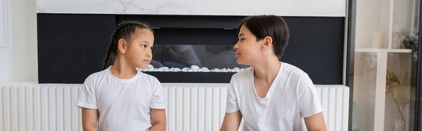 Asian siblings looking at each other at home, banner  - Photo, image
