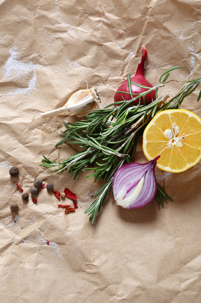 Spices and lemon on paper - Φωτογραφία, εικόνα