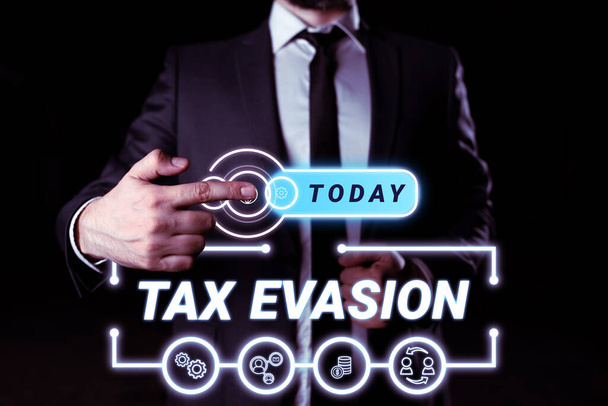Text sign showing Tax Evasion, Conceptual photo the failure to pay or the deliberate underpayment of taxes - Photo, Image