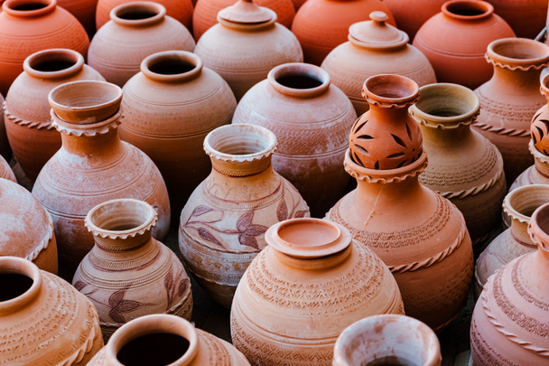 Hand Made Pottery in Nizwa Market. Clay Jars at the Rural Traditional Arabic Bazaar, Oman. - Photo, Image