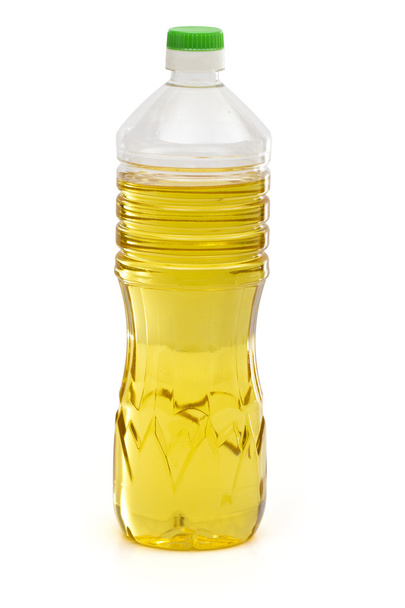 Sunflower oil on the white background - Photo, Image