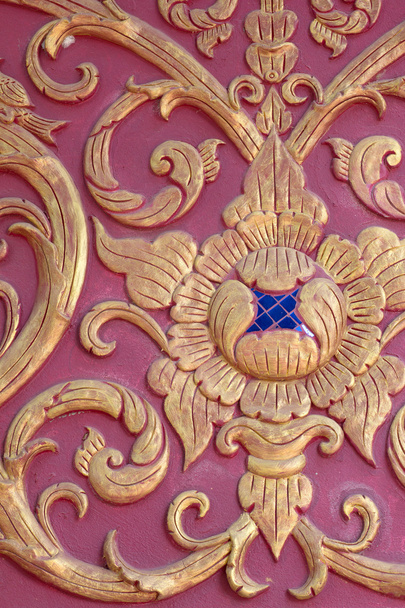 parede de estuque cor borgonha arte tailandesa
 - Foto, Imagem