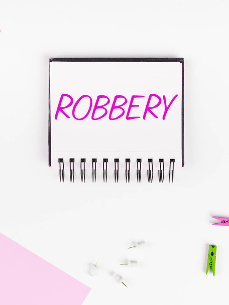 Text showing inspiration Robbery, Business overview the action of taking property unlawfully from a person or place by force or threat of force - Photo, Image