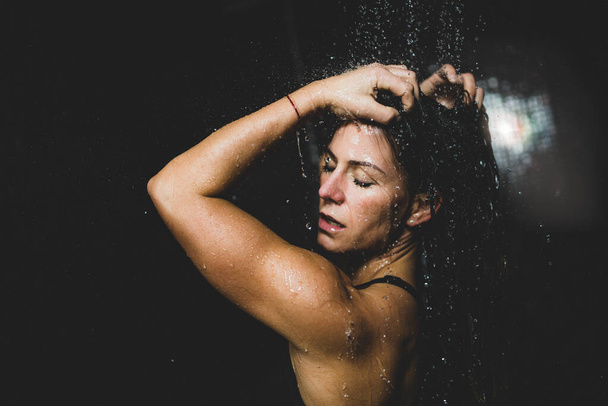 Beautiful Woman Taking a Shower after Spa Center Sauna. - Photo, Image